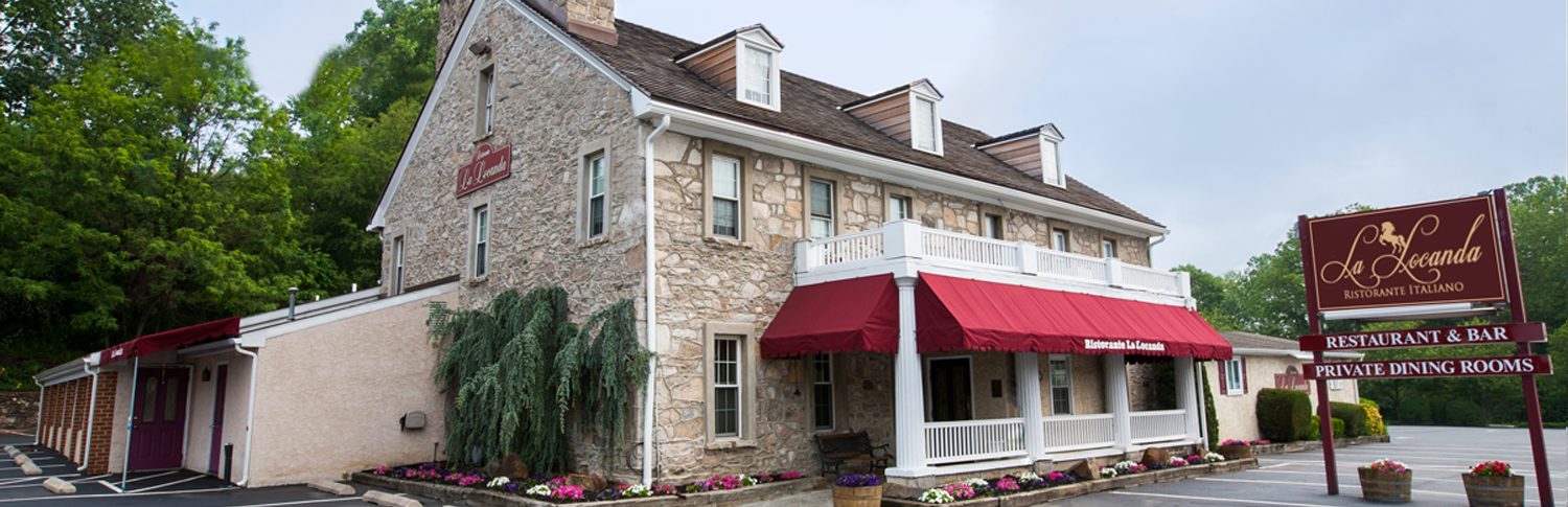 the stone exterior of La Locanda